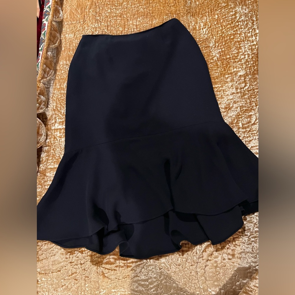 Michelle, mermaid hem- classic black skirt. Size 10.
